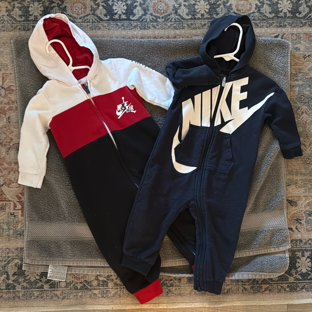 Nike (12m) and Air Jordan (18m) hooded onesies
